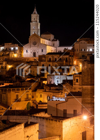 Scenic illuminated cathedral of Matera at night, Southern Italy Scenic illuminated cathedral of Matera at night, Southern Italy 115244020