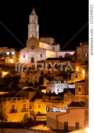 Scenic illuminated cathedral of Matera at night, Southern Italy Scenic illuminated cathedral of Matera at night, Southern Italy 115244021