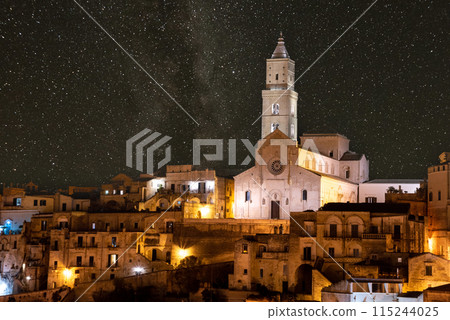 Scenic illuminated cathedral of Matera at night, Southern Italy Scenic illuminated cathedral of Matera at night, Southern Italy 115244025