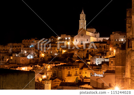 Scenic illuminated cathedral of Matera at night, Southern Italy 115244028