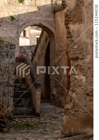 Abandoned alley with staircase in the historic downtown of Matera, Southern Italy Abandoned alley with staircase in the historic downtown of Matera, Southern Italy 115244038