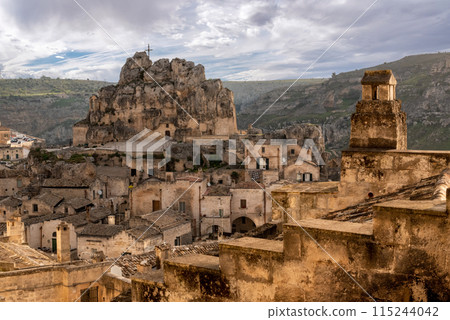 Scenic cityscape of Matera with the cave church Saint Mary of Idris, Southern Italy 115244042