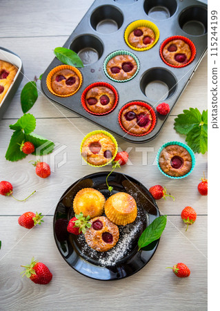 Sweet curd muffins with strawberry filling Sweet curd muffins with strawberry filling 115244199