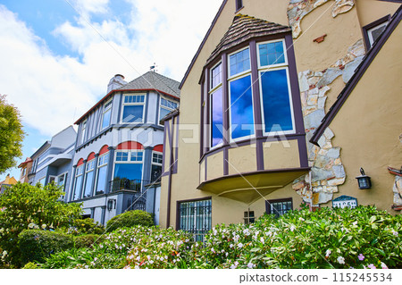 Detail looking up at modern San Francisco home two story windows Detail looking up at modern San Francisco home two story windows 115245534