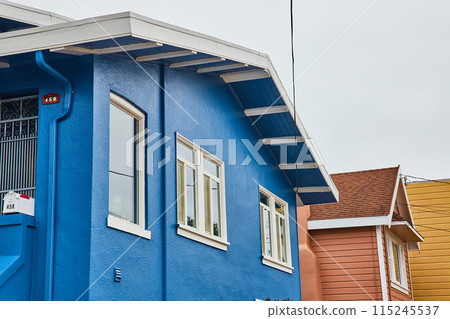 Detail of exterior blue home in white trim of San Francisco, USA on cloudy day Detail of exterior blue home in white trim of San Francisco, USA on cloudy day 115245537