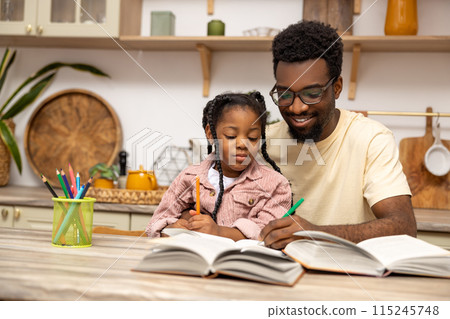 Young dad explaining kid daughter learning doing homework 115245748