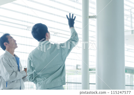 A worker who maintains piping 115247577