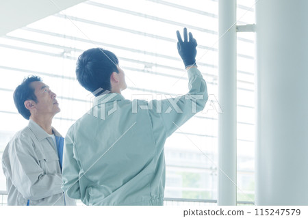 A worker who maintains piping 115247579