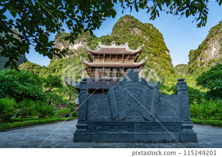 Vietnam Hanoi: A temple to visit on a boat tour of Ninh Binh, a valley river on a rowboat 115249201