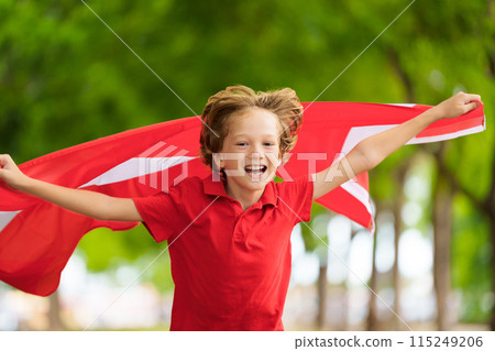 Child running with Austria flag. Austrian fan. Child running with Austria flag. Austrian fan. 115249206