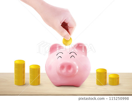 Hand puts gold coins into a piggy bank and a pile of gold coins on a wooden table. white background Hand puts gold coins into a piggy bank and a pile of gold coins on a wooden table. white background 115250998