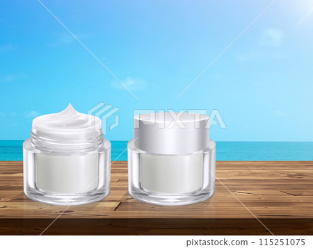Opened and closed cream jar on wooden table with the sea in the background 115251075