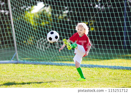 Portugal football fan kids. Children play soccer. 115251712