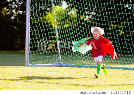 Portugal football fan kids. Children play soccer. 115251718