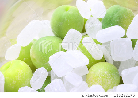 Plum work: Plums and rock sugar in a storage jar Plum work: Plums and rock sugar in a storage jar 115252179