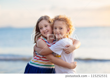 Kids play on tropical beach. Sand and water toy. Kids play on tropical beach. Sand and water toy. 115252531