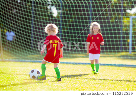 Portugal football fan kids. Children play soccer. Portugal football fan kids. Children play soccer. 115252539