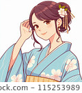 A young woman in a yukata brushing her hair aside with one hand 115253989
