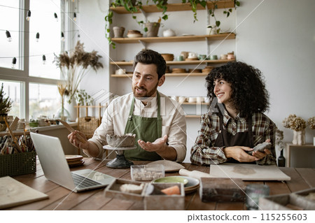 Bearded man and woman creating pottery for online video course 115255603