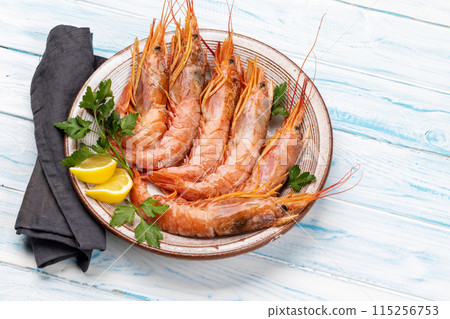 Fresh seafood. Plate with langoustines Fresh seafood. Plate with langoustines 115256753