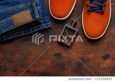 Men's Clothing on wooden Background Men's Clothing on wooden Background 115256972