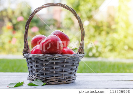 Basket with fresh red apples Basket with fresh red apples 115256998