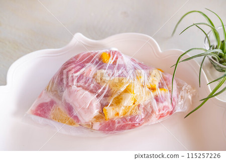 Pork loin with salt and lemon 115257226
