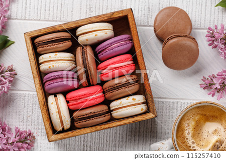 Colorful macaroons, arranged in a delightful display of vibrant hues Colorful macaroons, arranged in a delightful display of vibrant hues 115257410