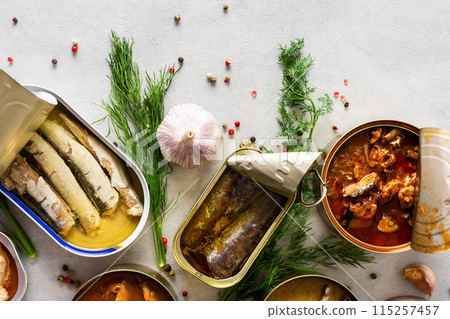 Open tin cans with canned fish Open tin cans with canned fish 115257457