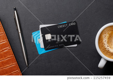 Black credit card on office table 115257459