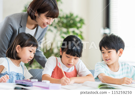 Elementary school students studying at cram school. Elementary school students studying at cram school. 115259250