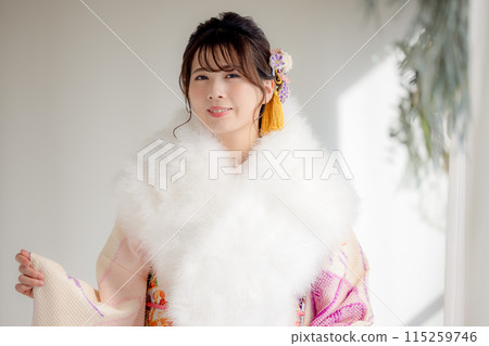 A portrait of a woman wearing a kimono with full kimono A portrait of a woman wearing a kimono with full kimono 115259746