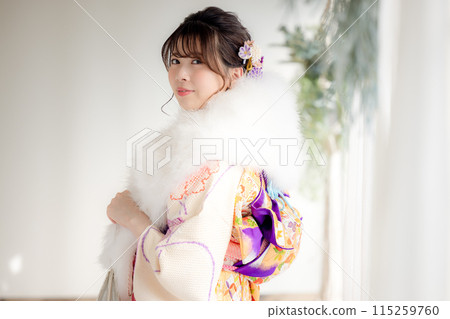 A portrait of a woman wearing a kimono with full kimono A portrait of a woman wearing a kimono with full kimono 115259760