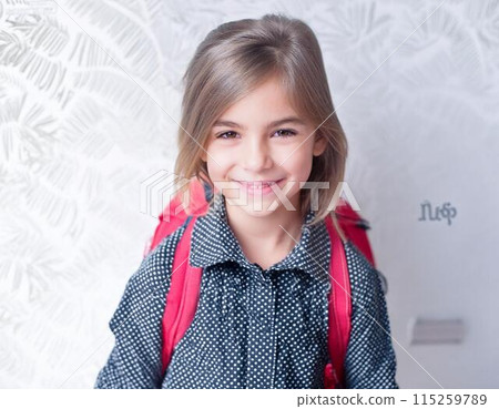 A foreign child in a neat and tidy outfit 115259789