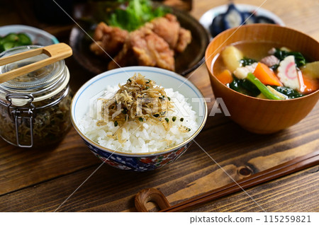 Soup and two side dishes: fried chicken and cucumber salad with Japanese pepper and dried baby sardines Soup and two side dishes: fried chicken and cucumber salad with Japanese pepper and dried baby sardines 115259821