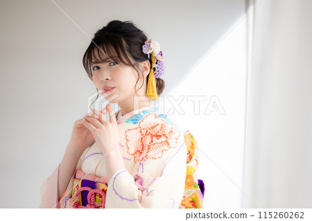 A portrait of a woman wearing a kimono with full kimono A portrait of a woman wearing a kimono with full kimono 115260262