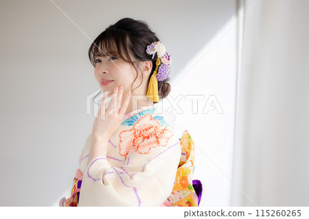 A portrait of a woman wearing a kimono with full kimono A portrait of a woman wearing a kimono with full kimono 115260265