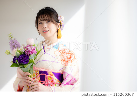 A portrait of a woman wearing a kimono with full kimono A portrait of a woman wearing a kimono with full kimono 115260367