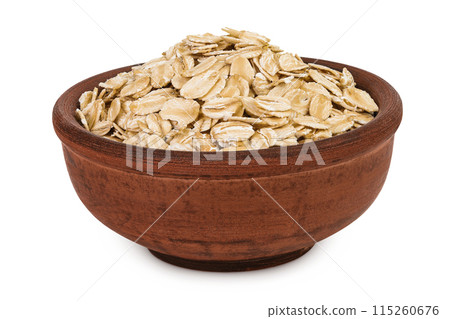 Oat flakes in brown ceramic bowl isolated on white background with full depth of field Oat flakes in brown ceramic bowl isolated on white background with full depth of field 115260676