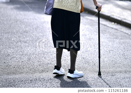 Yokohama cityscape in Japan: Uneven road surfaces and steps make it dangerous for elderly people with mobility issues. = Yokohama city Yokohama cityscape in Japan: Uneven road surfaces and steps make it dangerous for elderly people with mobility issues. = Yokohama city 115261186