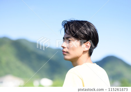 Man resting on a bridge 115261873