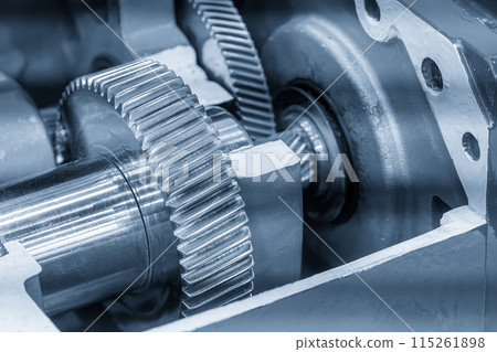 Close up scene the cutaway transmission gear parts in the light blue scene. Close up scene the cutaway transmission gear parts in the light blue scene. 115261898