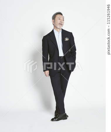 Middle-aged businessman on white background (full body) 115261946