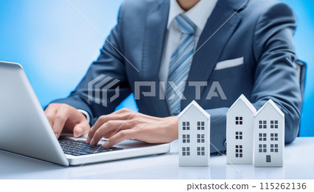 Searching for a house using a computer Real estate business image Searching for a house using a computer Real estate business image 115262136