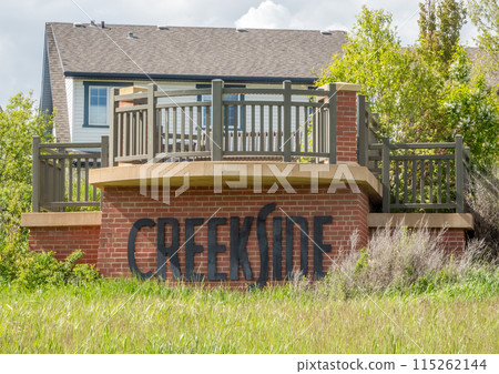 Calgary, Alberta, Canada. Jun 4, 2024. A front view of the Creekside Community sign. 115262144