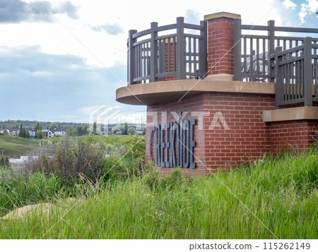 Calgary, Alberta, Canada. Jun 4, 2024. A side view of the Creekside Community sign. 115262149