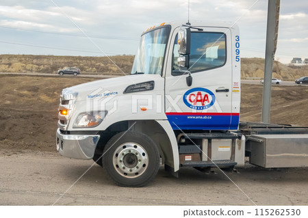 Calgary, Alberta, Canada. Apr 24, 2024. The front profile view of an AMA or CAA Alberta Motor Association truck on the road. Calgary, Alberta, Canada. Apr 24, 2024. The front profile view of an AMA or CAA Alberta Motor Association truck on the road. 115262530