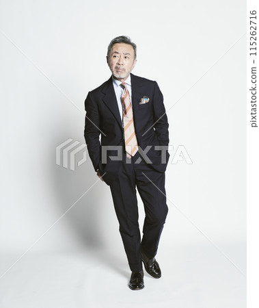Middle-aged businessman on white background (full body) 115262716