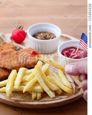 Chicken nuggets and fries Chicken nuggets and fries 115263228