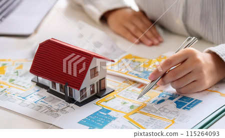 Building a house; thinking about buying and selling real estate; concerned about the environment; real estate image 115264093